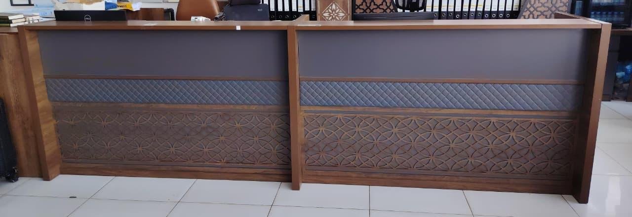 Modern Reception Counter in Walnut with Quilted Slate Borders & Geometric Cutouts