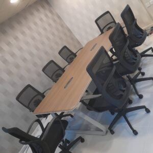 Modern and classic Meeting Table with Light Wood Grain Top, Beveled White Trim, and Geometric Silver Frame